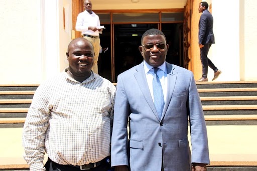 Hon. Prof. Twaha Kaawaase Kigongo with Alex Kasaali